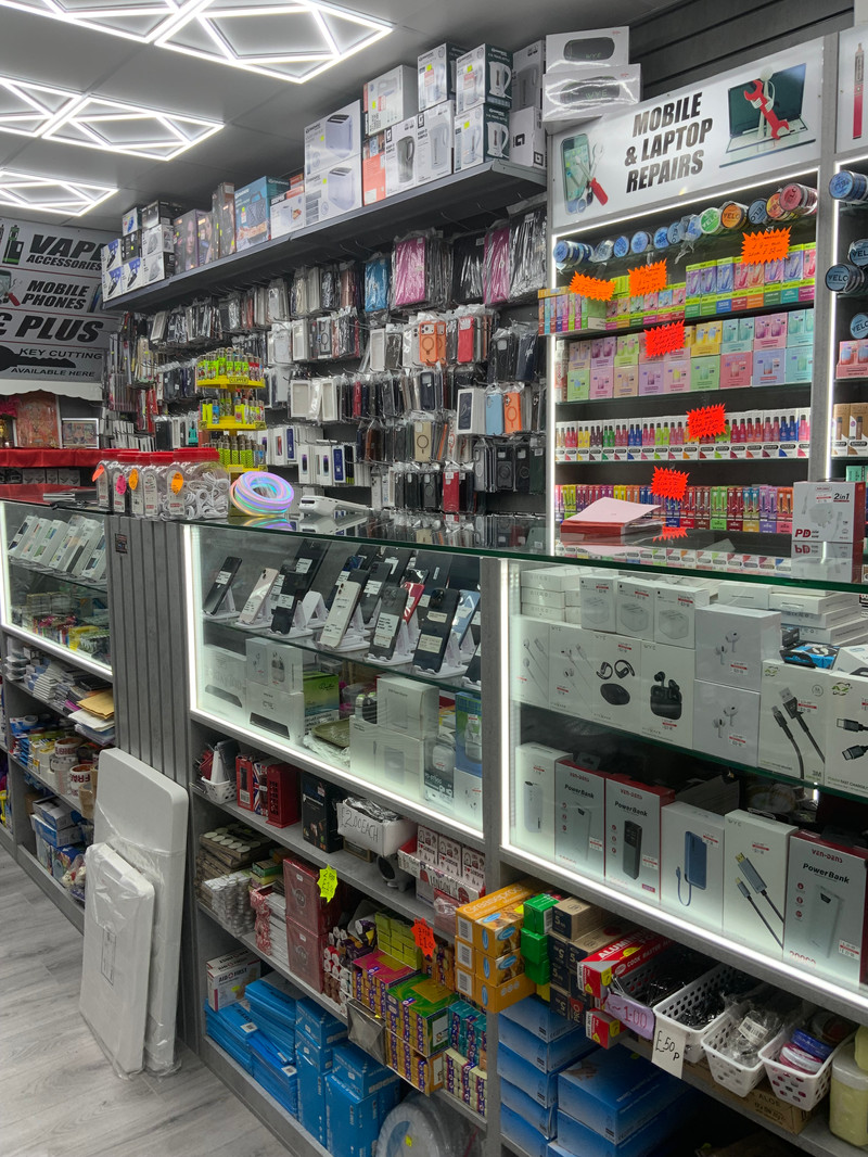 Mobile & Laptop Repairs section with phones and accessories